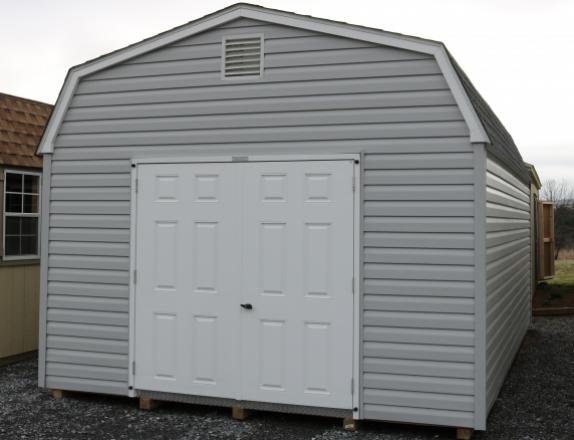 Pine Creek 12x20 HD Dutch Barn Barn with Harbor Stone walls, White trim and Black shutters, and Charcoal shingles